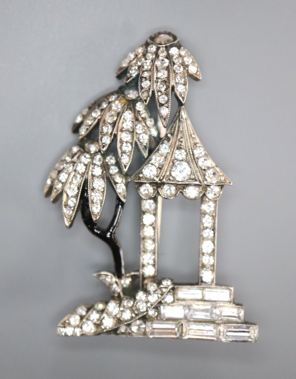 A continental Art Deco 935 white metal and paste set brooch, 34mm, depicting a house with trees, gross 6.1 grams,